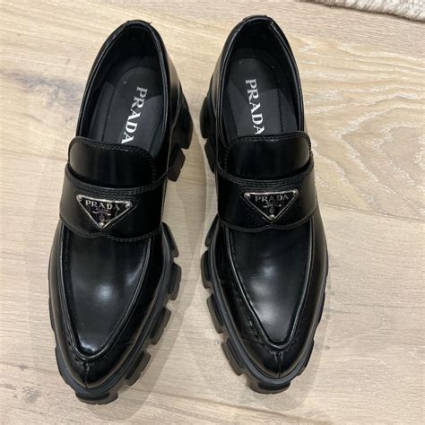 monolith pointy brushed leather loafers prada|prada high heeled loafers.